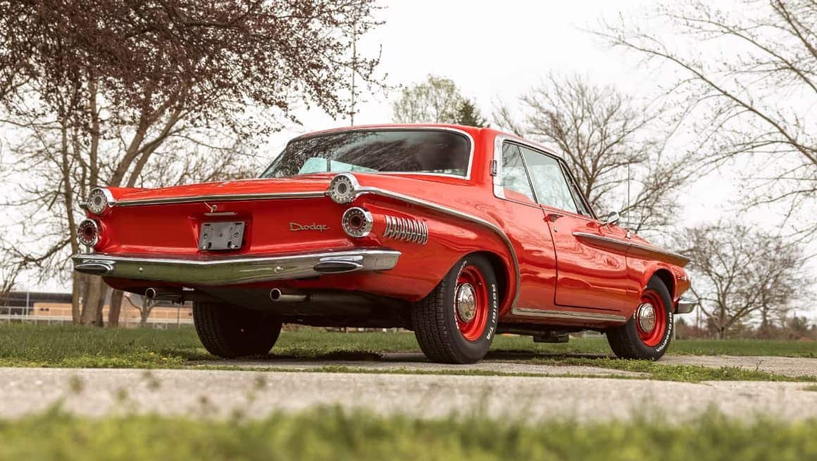 1962 Dodge Dart 440 with Viper Red finish, Red and Tan leather interior, and 440 CI V-8 engine.