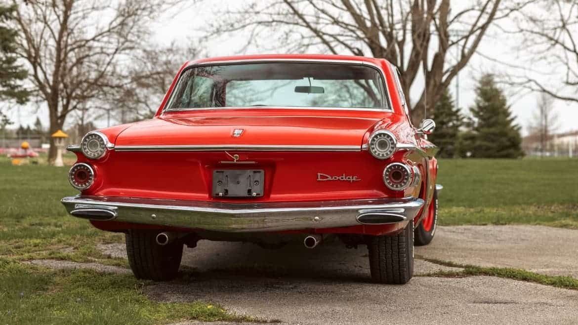 1962 Dodge Dart 440 with Viper Red finish, Red and Tan leather interior, and 440 CI V-8 engine.